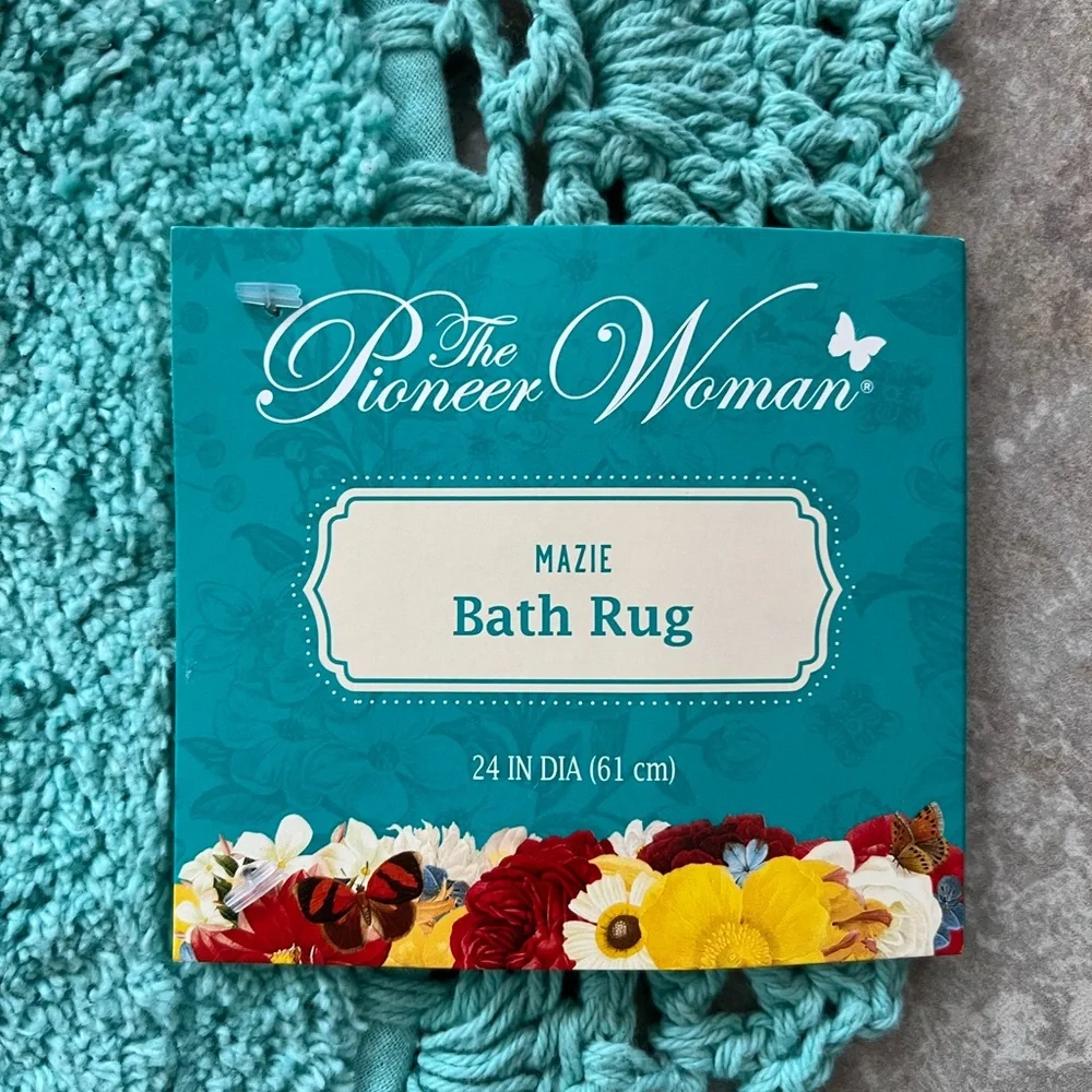 The Pioneer Woman “Mazie” round bath rug.